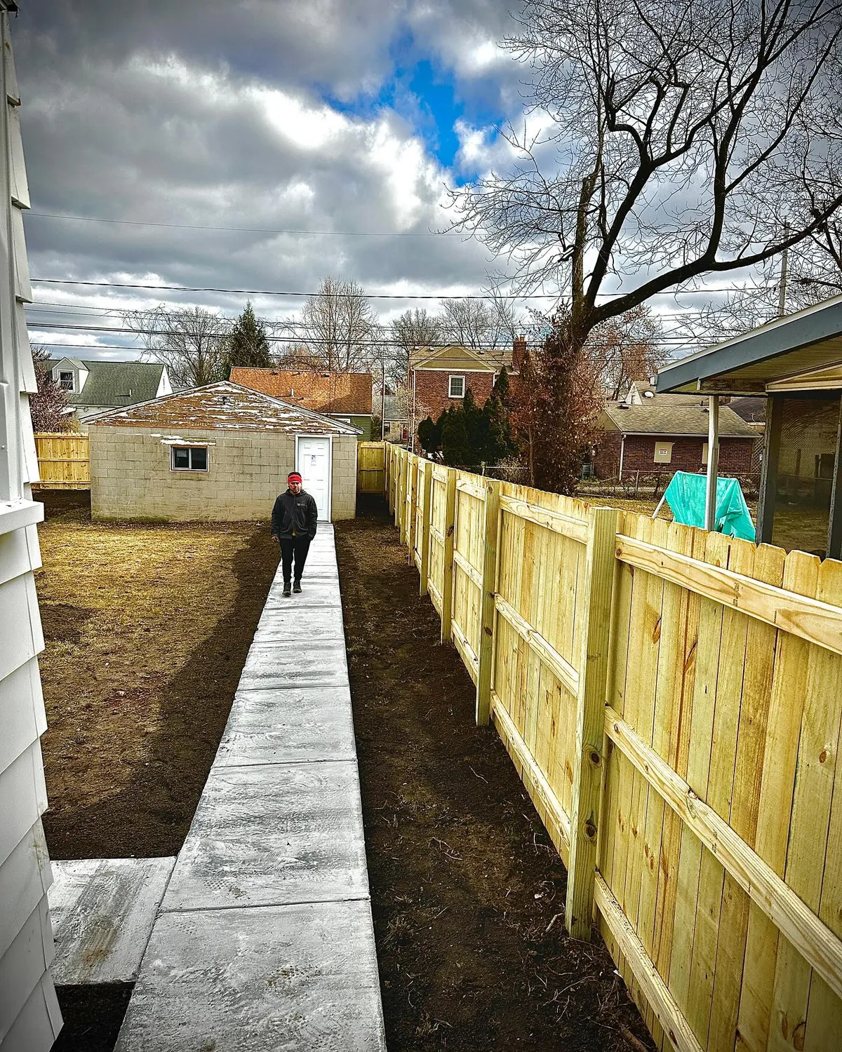 Concrete walkway with fence, Columbus OH by Iron Edge Outdoor