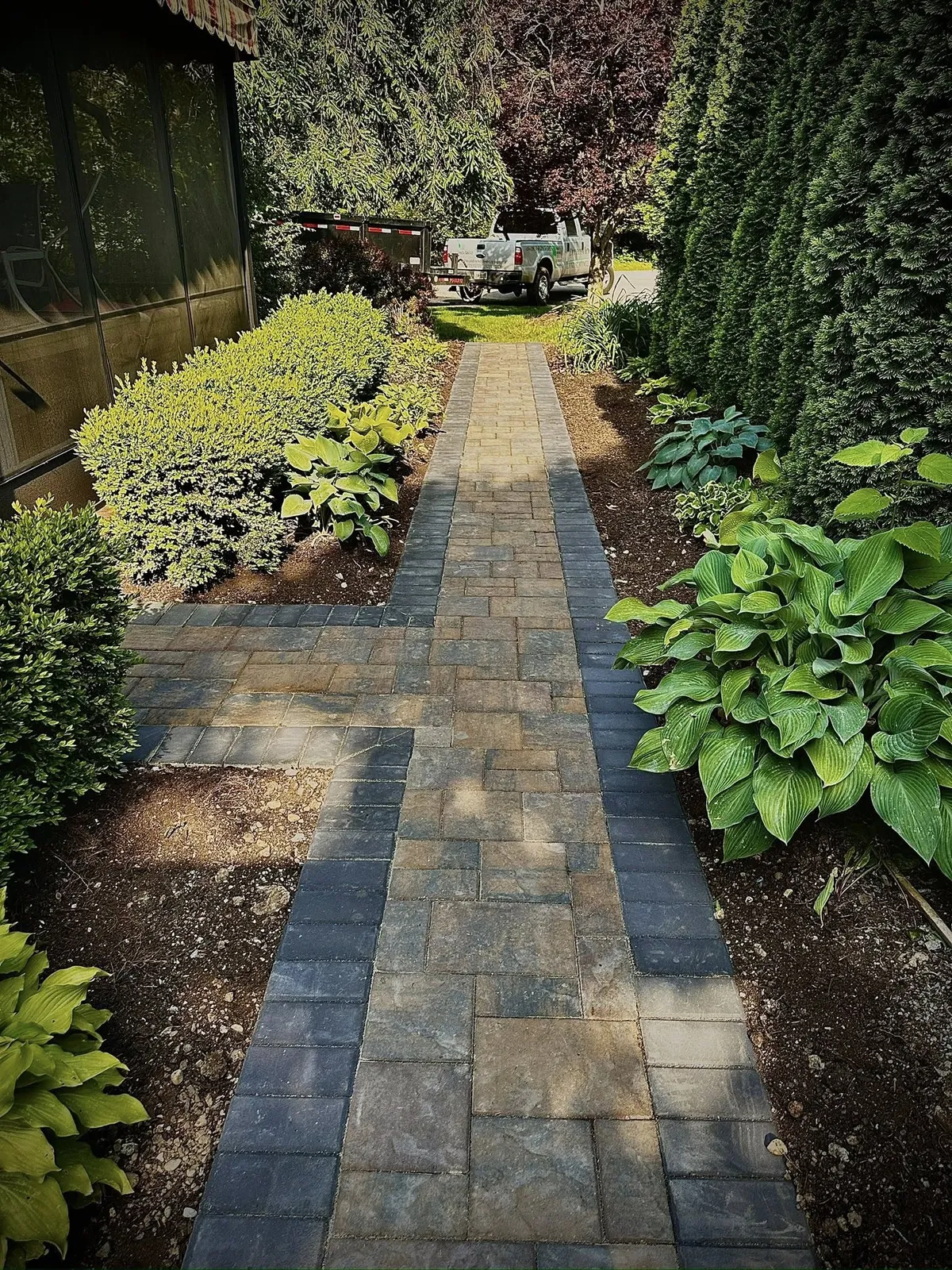 Paver walkway through garden, Columbus OH by Iron Edge Outdoor