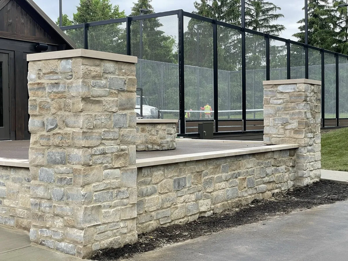 Stone pillar wall glass panel, Columbus OH by Iron Edge Outdoor