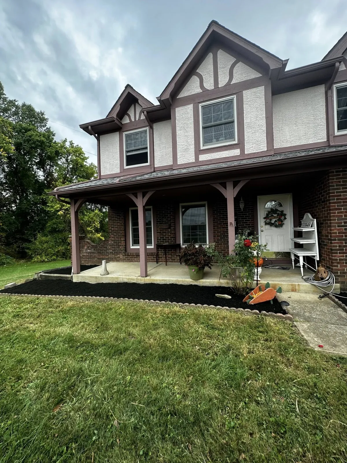Front mulch bed porch plantings, Columbus OH by Iron Edge Outdoor